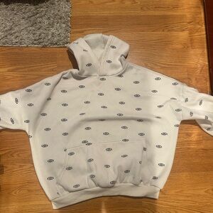 White Hoodie with Eye Pattern